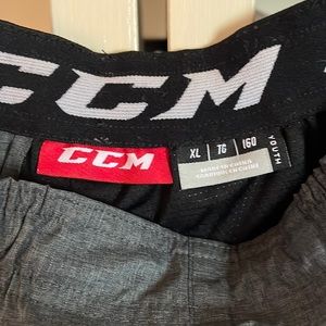 CCM hockey pants never worn. Zippers on pockets still wrapped as shown.